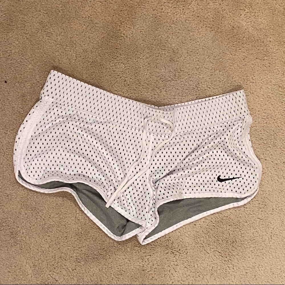Reversible white nike running shorts women size L